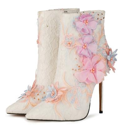 China Large size female booties chime shorts high heels waterproof women's handmade floral side zipper embroidery stiletto ankle boots for sale