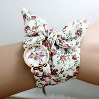 China Brand New Non-Specific Women Dress Lady Female Fashion Watch Flower Summer Fashion Cloth Strap Wristwatch for sale