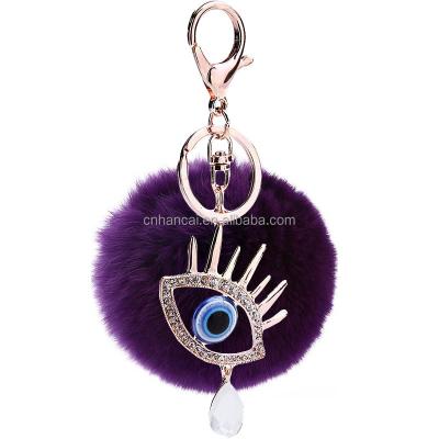 China Crystal Evil Eyes Key Ring Faux Stone Fluffy Car Key Chain Ball Plush Metal Key Chains Purse Pendant Keychain Fur Pompom Key Chain Pendant for sale