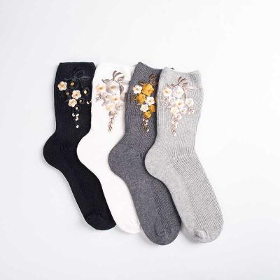 China Breathable Ladies Fashion Flower Cotton Socks Custom OEM Crew Tube Designer Socks Women for sale