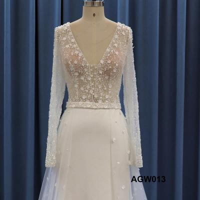 China Long Sleeve V-Neck Lace Anti-Static Wedding Dress Beading 3 D Flower Lace Bridal Dress for sale