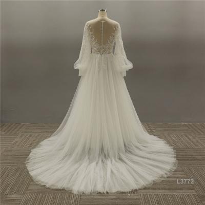 China Anti-Static White Ivory Long Sleeve Puff Tulle Wedding Dress A-Line Bridal Dress For Women for sale