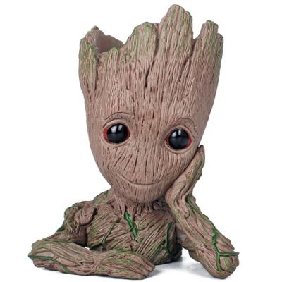 China Planter/Storage Creative Office Home Decor and Youthful Groot Pen Holder Stationery Storage Movie Character Tree People Resin Planter for sale