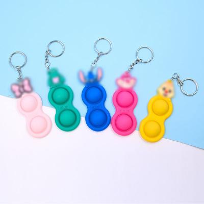 China Gift Q1597 Kids Trigger Rubber Cartoon Wiggle Toy Keychain Mini Sensory Fidget Toys Key Chains for sale