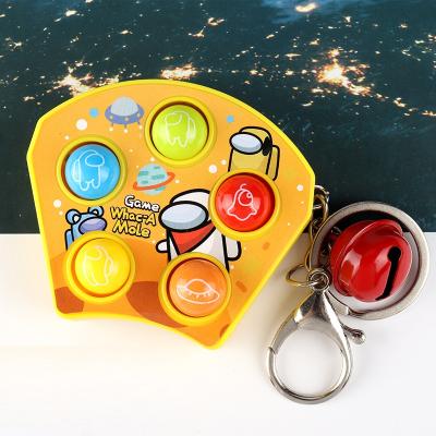 China Q807 Trigger Kids Simple Sensory Astronaut Keychain With Bells Trigger Space Person Toys Plastic Key Chain for sale