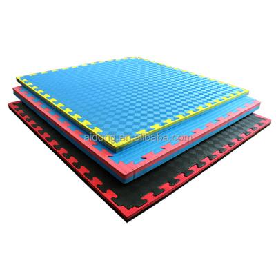 China Martial Arts High Density Sponge AIDONG Mats Muttahida Majlis-e-Amal Wrestling Gym Kickboxing Eva Foam Mat Jigsaw Puzzle Mat Interlocking for sale