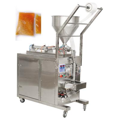 China Easy Work Computer System Automatic Strawberry Jam Yogurt Sealing And Packaging Machine for sale