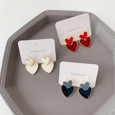 China 2021 OUYE Summer CLASSIC Popular Simple Heart Shape Earrings Fashion Women Stud Earrings Wholesale Jewelry Alloy Earrings for sale