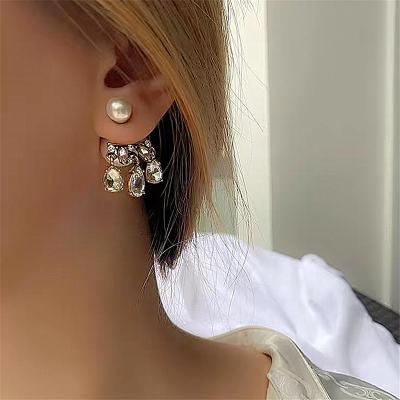 China OUYE South Korea's New Front And Rear Earrings Drop Earrings CLASSIC S925 Female Retro Water Pearl Earrings New Front And Rear Earrings for sale