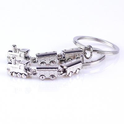 China New Cute Metal Design Keychains Three-Section Key Chain Train Key Holder Key Holder for sale