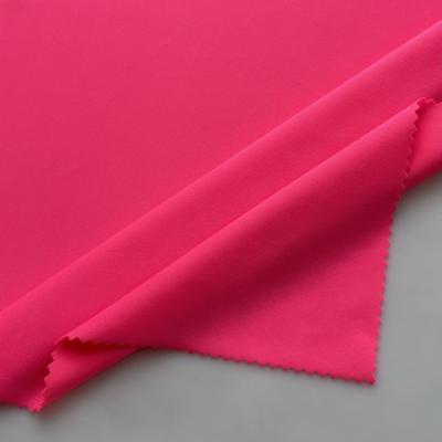 China Wicking Solid Color 4 Way Stretch Elastic Swimwear Knit Leggings Fabric 86polyester 14spandex Fabric for sale