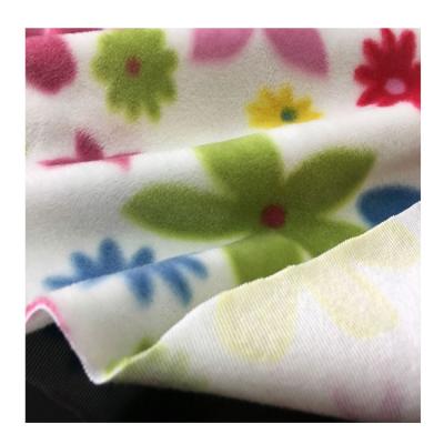 China Custom Wholesale Super Soft Wicking Coral 100% Polyester Printed Flannel Plaid Fleece Fabric For Blanket for sale