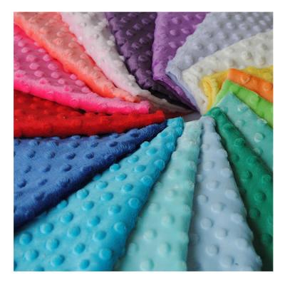 China Wholesale Memory Polyester Embossed Baby Cuddle Bubble Minky Fabric Dot Plush Baby Blanket Solid Minky Fabric for sale