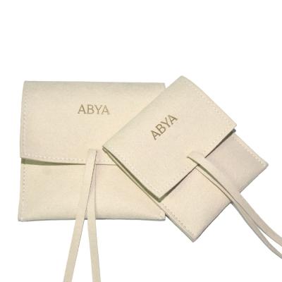 China Recyclable Custom Gold Foil Printed Drawstring Wrap Velvet Pouch Suede Jewelry Pouch With Ribbon for sale