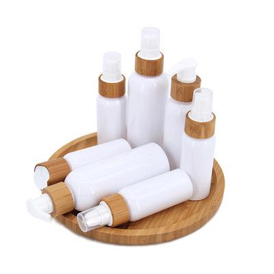 China Bamboo Cosmetic Jar Cover Milk PP Bottle 100ml Press Cover Bamboo Bottle for sale