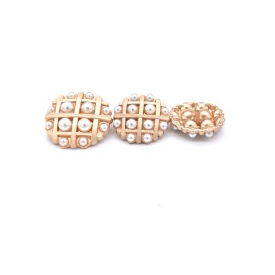 China Other biscuits form 20mm gold plating pearl alloy wholesale leg button for clothes in stock for sale