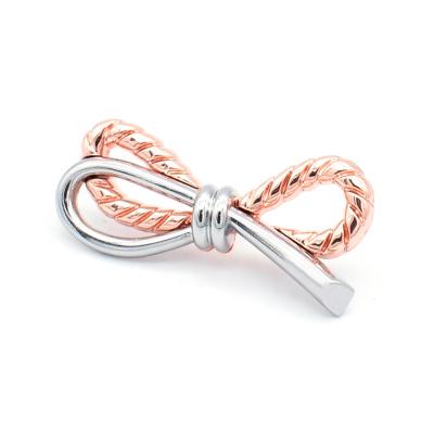 China Handbag Pin Badge Custom Rose Gold Nickel Double Color Alloy Garment Metal Logo Bow Shape Decoration For Bag for sale