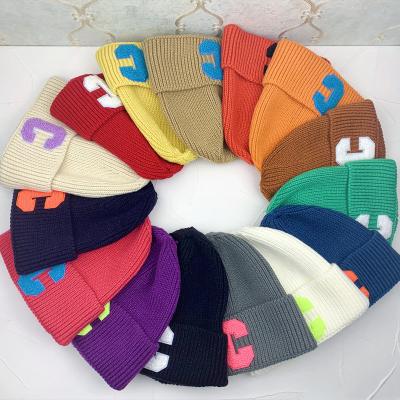 China Polyester / Cotton Winter Wool Knit Hat Warm Letter C Knitted Beanie Unisex for sale