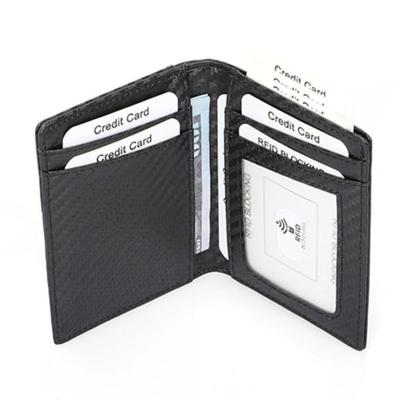 China Anti-Theft Carbon Fiber PU Leather RFID Card Holder with Pull Design, Fashion Minimalist Bifold Fashion Carbon Fiber Card Wallet for sale