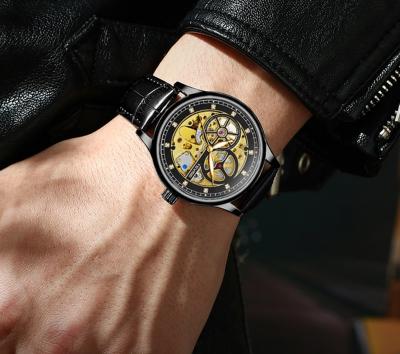 중국 Golden Leather Material Automatic Wrist Watch Hollow Transparent 판매용