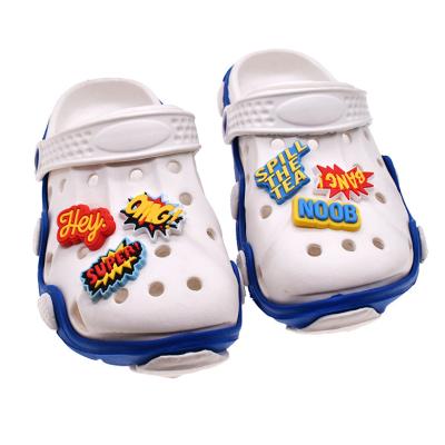 China PVC Soft Shoes Charms Newest Individual Word PVC Rubber Babies Jug Shoes Charms Packing Decoration Accessories for sale