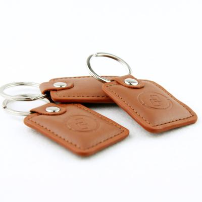 China Size 13.56mhz Tamperproof NFC Keytag Rfid Key Tag C or Read/Write Ultralight Leather Customized MINI BY TAG for sale