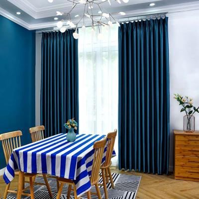 China Solid Blue Blackout Durable Full Light Shading Blackout Curtains For Home And Business With Electric Cutout Pattern for sale