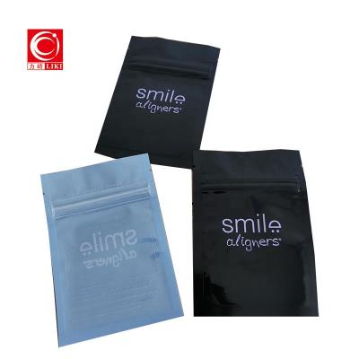 China OEM Logo Custom Design Printing Hole Moisture Proof Three Handle Seal Bag Side Punch / Mylar Pouch for sale