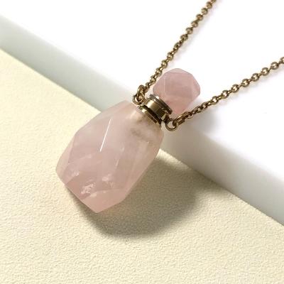 China Portable Natural Crystal Essential Oil Bottle With Stainless Steel Necklace 3ml Empty Jade Stone Oil Bottle Gemstone Perfume Bottle for sale