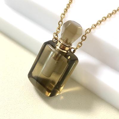 China Portable Empty Crystal Essential Oil Bottle Citrine Crystal Oil Perfume Bottle Gemstone 3ml Empty Oil Bottle With Gold Collar for sale