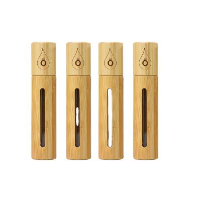 China Cosmetic customization roll-on bottle 5ml cover essential oil bottle storage available bamboo wood bottle for sale