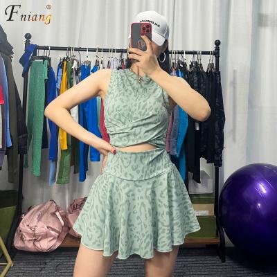 China New Style Breathable Leopard Printed Cross Edge Yoga Vest Double Layer Tennis Skirt With Shorts Pockets For Golf Running Fitness for sale