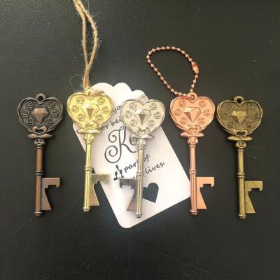 China Sustainable Love Key Bottle Opener Wedding Favors Personalized Wedding Favors Decorations with Card Tag and Chains for sale