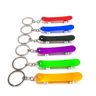 China Sustainable Fashion Scooter Shape Aluminum Alloy Beer Opener Portable Hang Waist Opener Custom Logo Metal Keychain Bottle Opener for sale