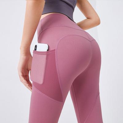 China HQSLP Breathable Ladies Hip Lift Gaiters High Waist Yoga Pants Abdominal Exercise Yoga Seamless Running Gaiters for sale