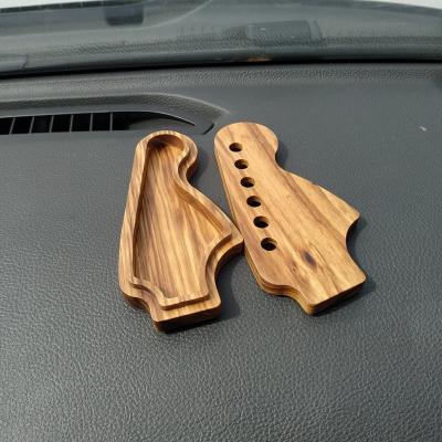 China Play and sing string instruments such as guitar/bass/ukulele factory direct selling can be customized new design shovel guitar pick solid wood bass box for sale