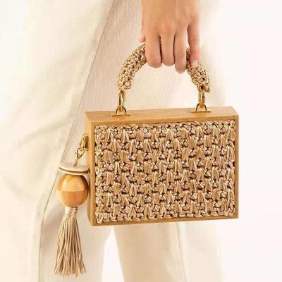 China Bohemian 2021 Summer Beach Tassel Straw Woven Bag Straw Woven Bag Bamboo Rattan Square Square Chain Strap Single Box for sale