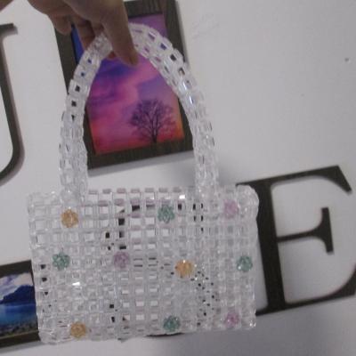 China Insti Fashion Vintage Ladies Celebrity Acrylic Flower Hollow Line Handwoven Vegetable Basket Beaded Pearl Handbag Women for sale