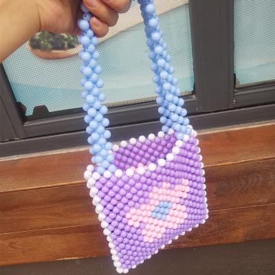 China High-grade Ins. Pvc Handmade Cosmetic Bag Flower Handbag Dinner Bag Dinner Handheld Hollow Pearl Bag Beaded Bag for sale