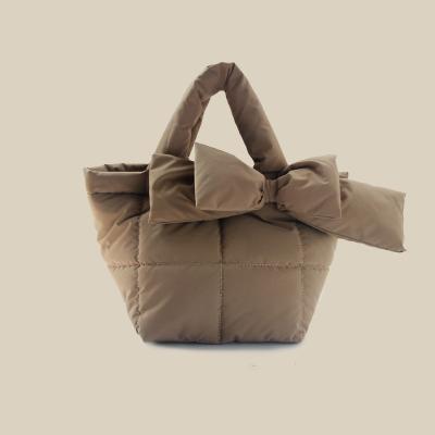 China Fashion 2021Winter new low sloping simple bubbled Carry Female Bucket fashion niche design bag knot bow shoulder for sale