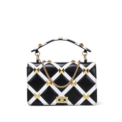 China PU 2021 New Hot Black And White Diamond Lattice Matching Rivet Bag One Shoulder Belt Flap Diagonal Portable Box for sale