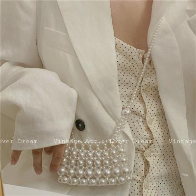 China Retro Satchel Commuter Temperament Girl Korean Geometric Beaded Satchel Imitation Pearl Shoulder Bag Flap for sale