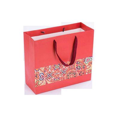 China Recyclable Luxury Custom Retail Gift Bag Retail Garment Bag Packing Paper Shopping Packaging Bags With Handles For Clothes for sale