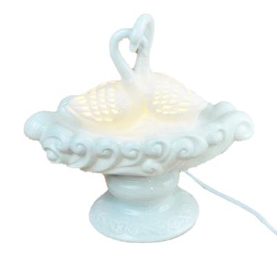 China Viable Swan Aroma Essential Oil Wax Melt Ceramic Electric Burner for sale