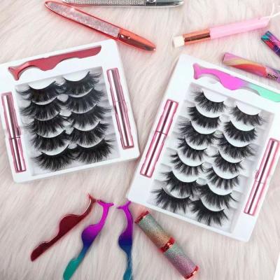 China 30 mm Christmas Backwoods Natural Tapered Crisscross Mink Eyelashes Black And White Wrapping With Custom Label for sale