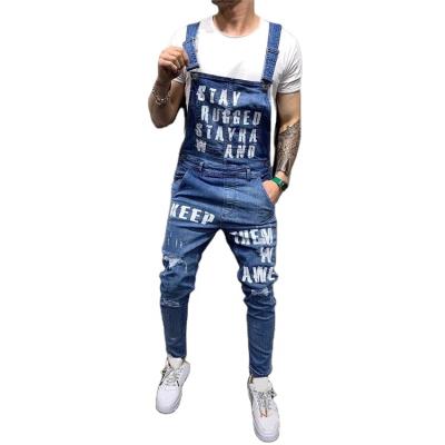 China Fashion Breathable Hot Men's Style Jeans Overalls Ankle Length Ripped Letter Print Distressed Denim Bib Overalls For Men Suspender Pants for sale