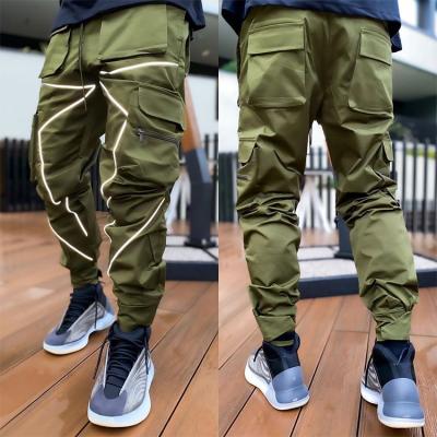 China 2022 new fashion QUICK DRY STYLE pants generally fashionable hip-hop personality high street men's loose reflective pants for sale