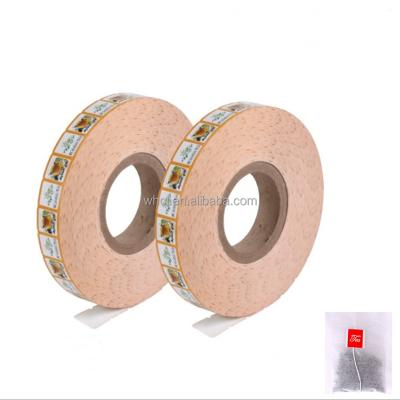 China Heat Sensitive Heat Sealed PE Coated Nylon Triangle Tea Bag Label Label Paper Roll For Packing Machine for sale