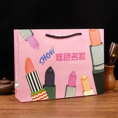 China Apparel Carry Reusable Shopping Packaging Custom Luxury 250gsm Luxury Pink Cosmetic Paper Bag For Jewelry Cosmetics Gift Apparel Shopping Packaging With Ribbon Handle for sale