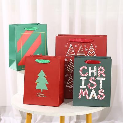 China Luxury Carry Shopping Packaging Shaped Christmas Birthday Gift Party Cloth Wrapping Decorative Paper Bags for Halloween Christmas Birthday Wedding Supplies for sale